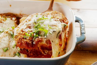 Dish Of Chicken Parmesan On A Table